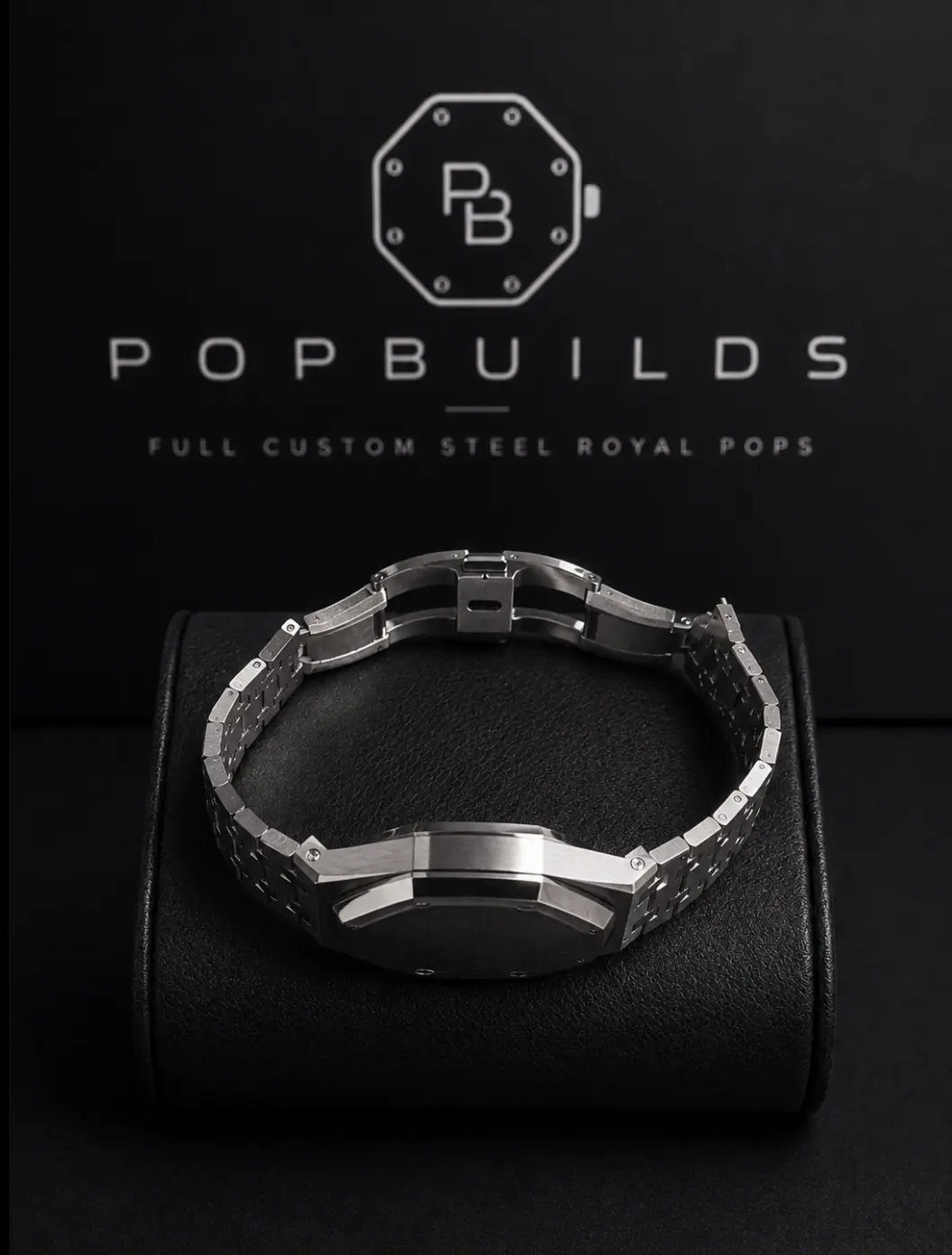 Side profile of a POPBUILDS stainless-steel case with integrated bracelet